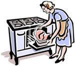 The woman is putting the food in the oven