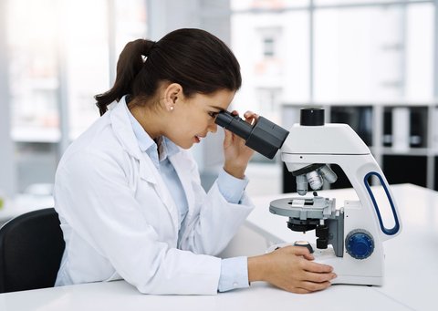 49839156 understanding the finer details a young scientist using a microscope in a lab